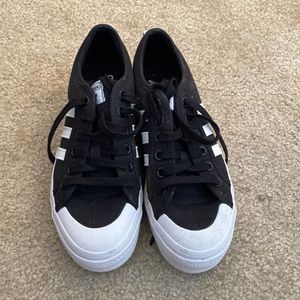 Black platform adidas sneakers